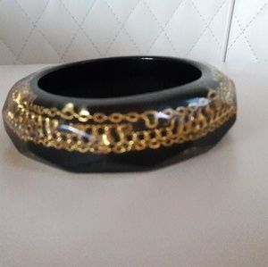 Vintage Lucite bangle bracelet with gold tone chai